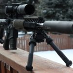 black sniper rifle scope