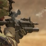soldier firing m4 rifle